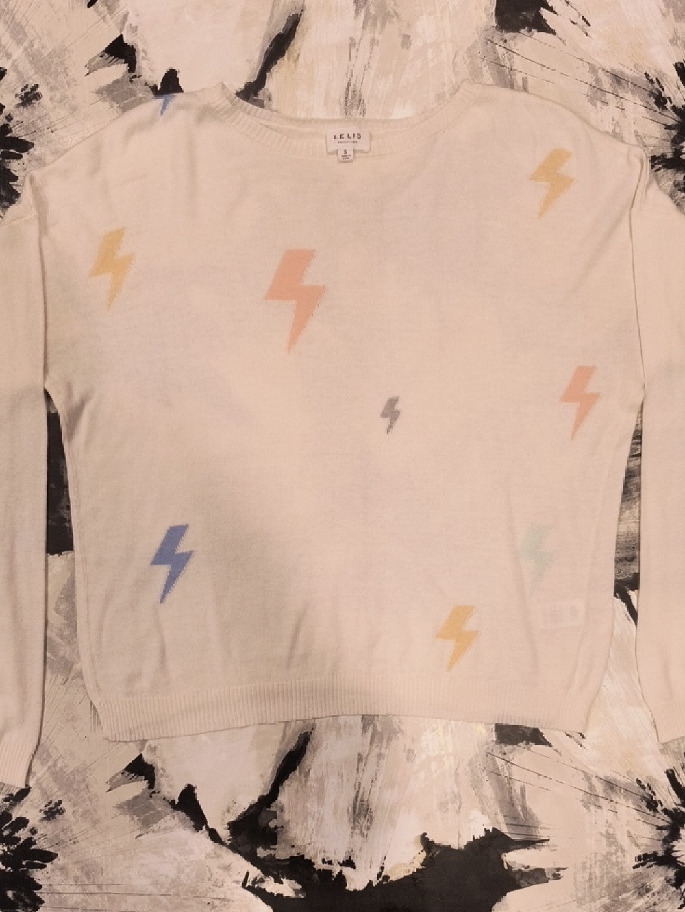 Le Lis Ivory Crewneck Sweater with Pastel Lightning Bolts